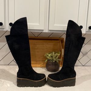 Black Platform Knee-High Boots approximate 3 inch heel.